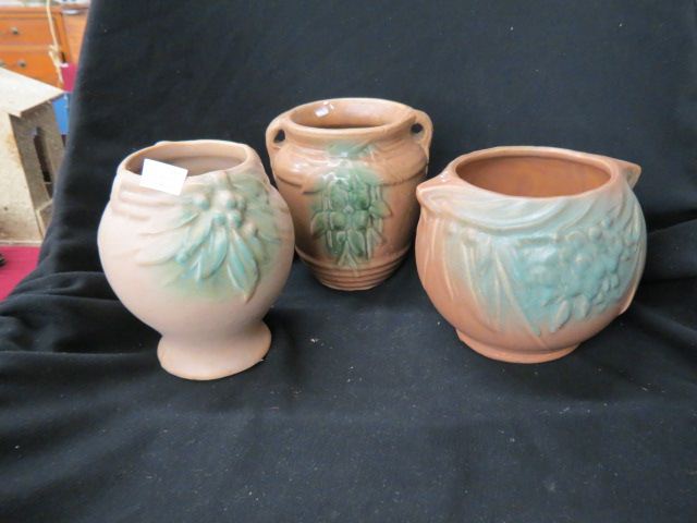 Appraisal: Brush-McCoy Pottery Vases fruit decor on brown to