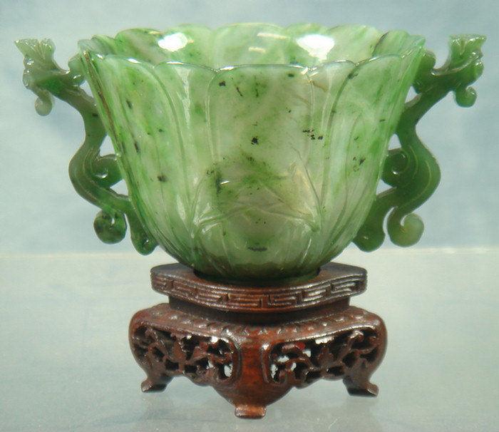 Appraisal: Carved spinach jade cup on hardwood stand lotus flower design