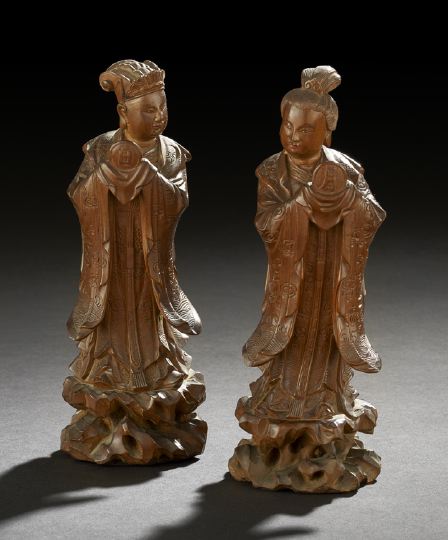 Appraisal: Two Chinese Carved Wooden Statues of Deities comprised of a