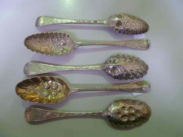 Appraisal: A COLLECTION OF FIVE VARIOUS GEORGIAN SILVER BERRY SPOONS with