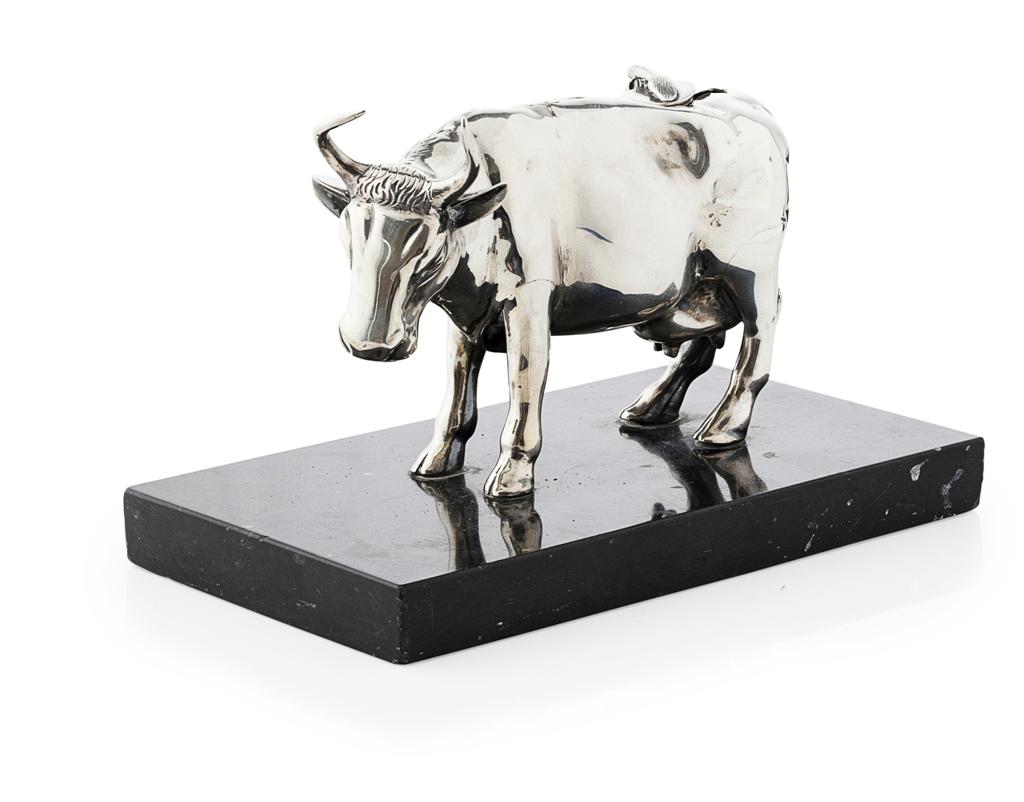 Appraisal: A silver cow apparently unmarked standing pose short horns small