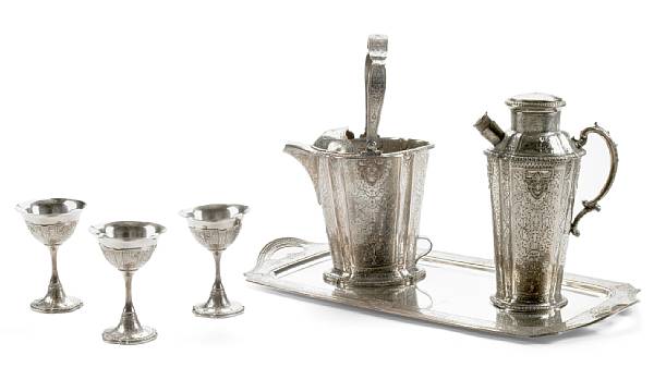 Appraisal: An American plated cocktail set comprising shaker ice bucket rectangular