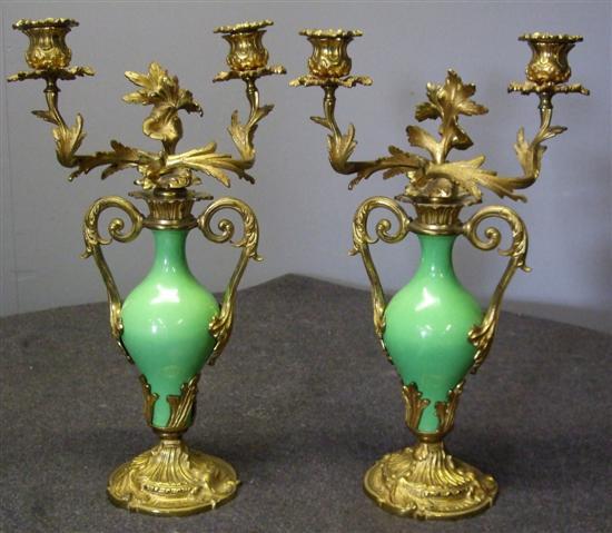 Appraisal: Pair of th century French green glazed vases with gilt