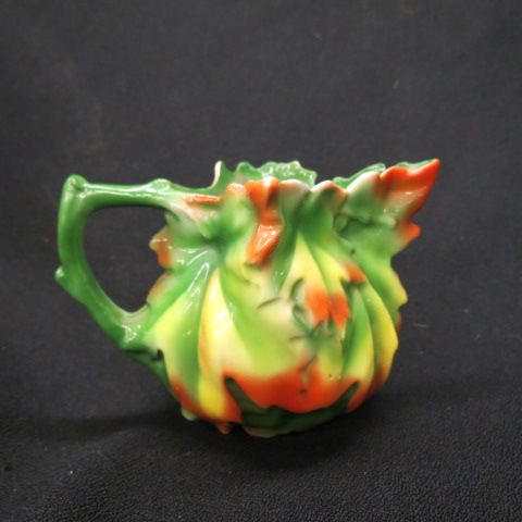 Appraisal: Royal Bayreuth Maple Leaf Figural Creamer excellent