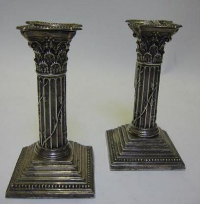 Appraisal: A PAIR OF CORINTHIAN COLUMN CANDLESTICKS Sheffield with detached sconces