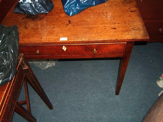 Appraisal: A Georgian oak side table with single frieze drawer with