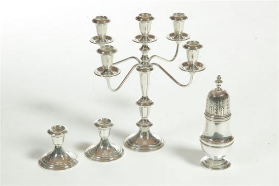 Appraisal: FOUR PIECES OF STERLING American th century Towle weighted candelabra