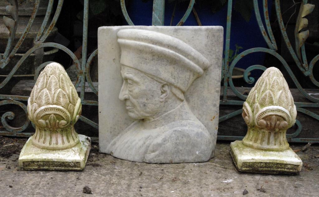 Appraisal: A small pair of oval and leafage Finials and a