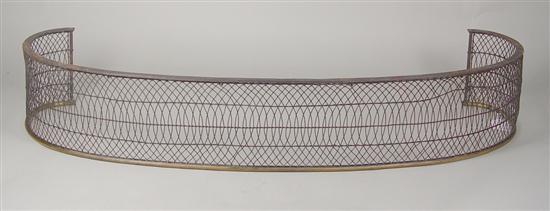 Appraisal: Brass Wire Fire Fender Circa Ovoid shaped fender with brass