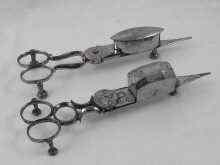 Appraisal: Two pairs of Russian steel candle snuffers c marked Tula