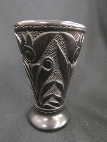 Appraisal: Indian Pottery Vase black carved floral signed excellent