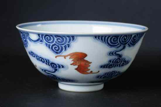 Appraisal: CHINESE BLUE AND IRON RED BAT BOWL Xuantong underglazed blue