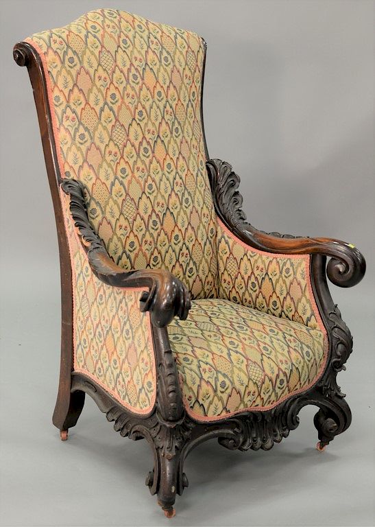 Appraisal: Large carved armchair with tapestry type upholstery ht in wd