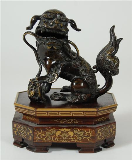 Appraisal: A Chinese gilt bronze lion dog Ming Dynasty or later