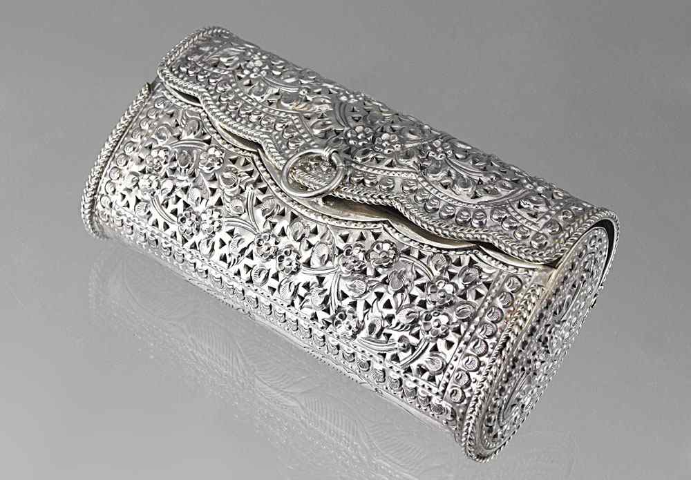 Appraisal: RETICULATED AND FLORAL EMBOSSED STERLING PURSE Floral design embossed with