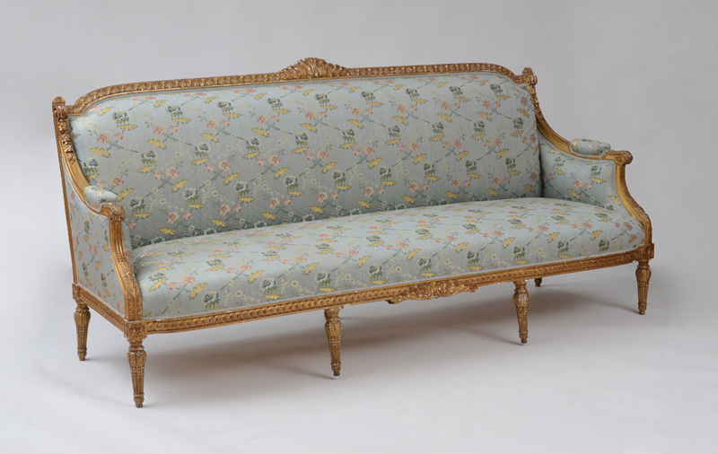 Appraisal: LOUIS XVI STYLE GILTWOOD SETTEE With an arched leaf-tip carved