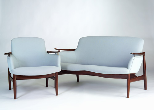 Appraisal: FINN JUHL NEILS VODDER settee and matching armchair upholstered in