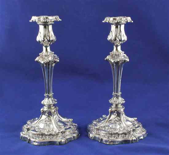 Appraisal: A pair of William IV Victorian silver candlesticks with fluted