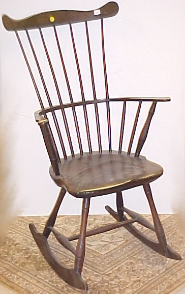 Appraisal: Windsor comb-back chair late th early th C arched shaped