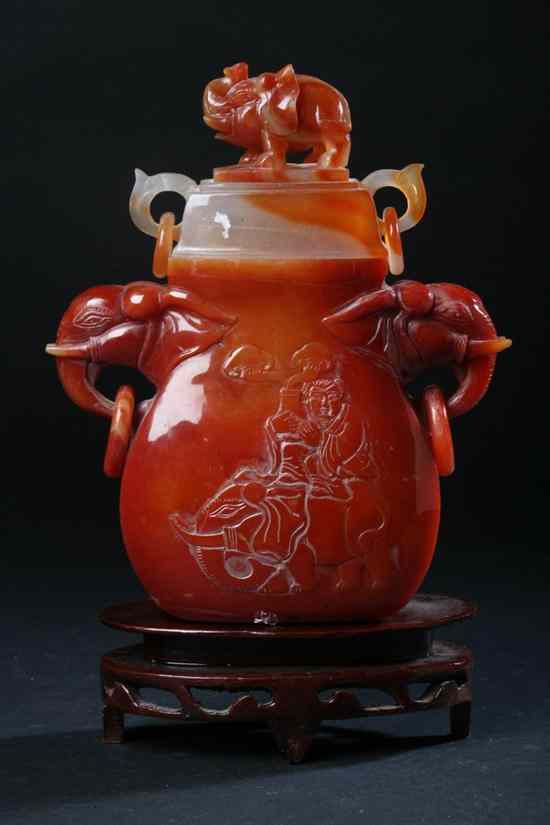 Appraisal: CHINESE AGATE VASE AND COVER Flattened ovoid-form carved with figure