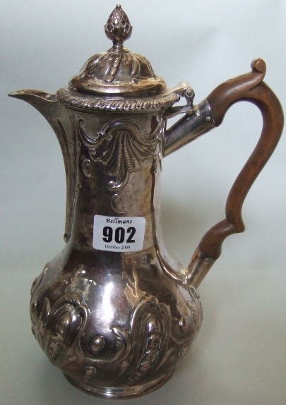 Appraisal: A silver hot water jug embossed with beaded and scrolling