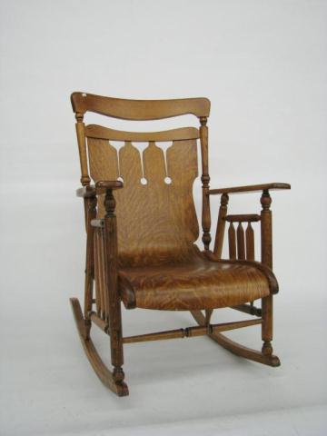 Appraisal: Antique golden oak rocking chair with quarter-sawn oak seat