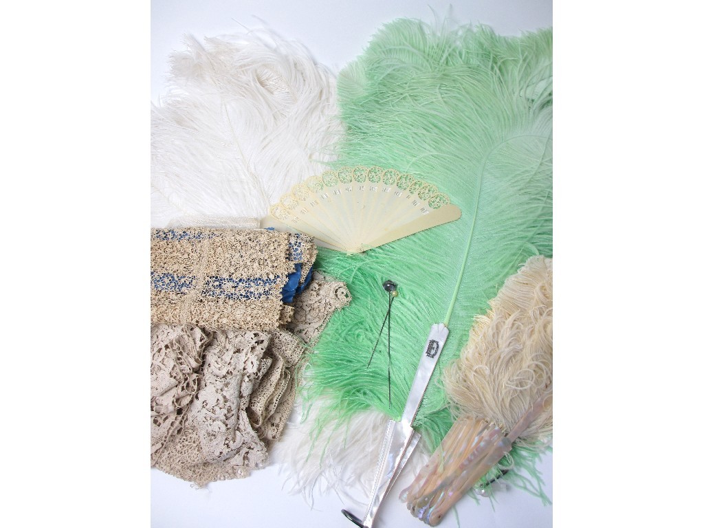 Appraisal: Three ostrich feather fans with mother of pearl sticks and