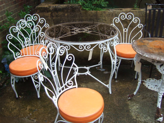 Appraisal: A mid th century white painted circular garden table and