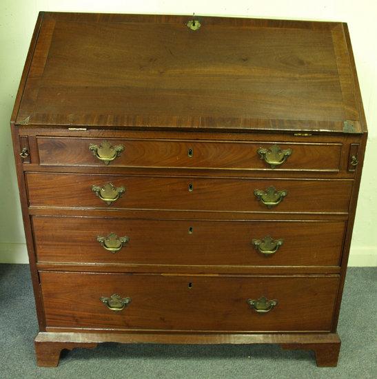 Appraisal: A late th Century mahogany bureau fitted beneath a fall