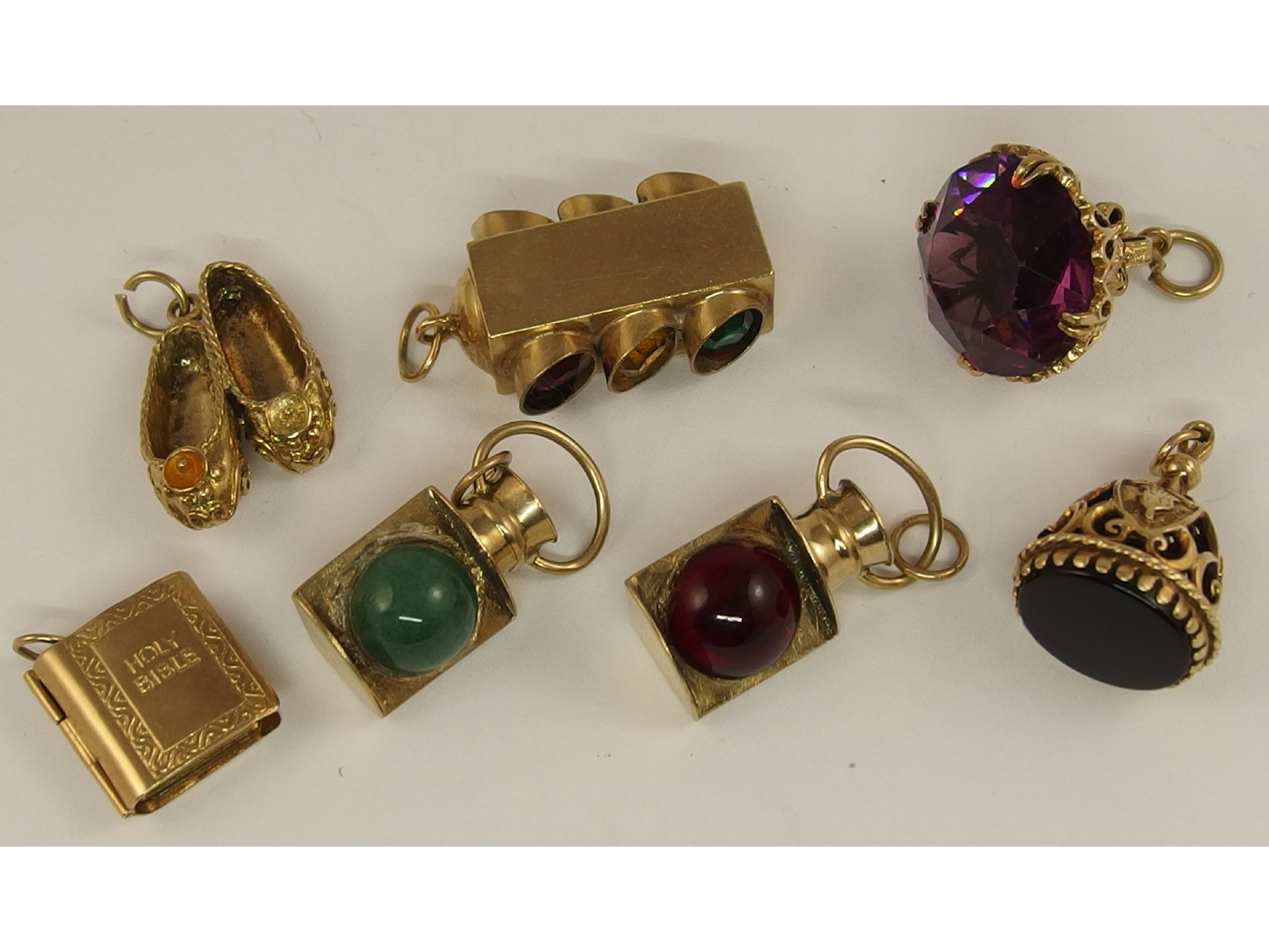 Appraisal: A collection of ct gold large charms to include port