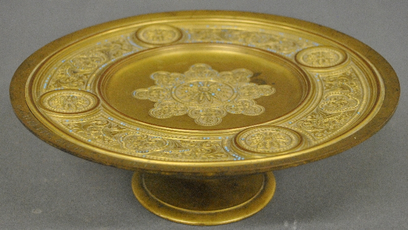 Appraisal: - French brass presentation pedestal plate decorated with floral reliefs