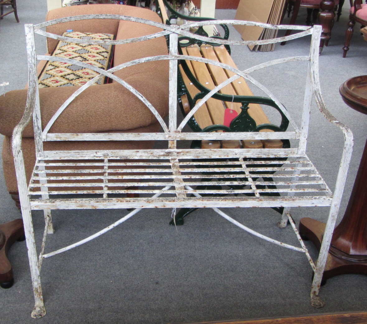 Appraisal: A Regency white painted wrought iron garden bench with interlaced