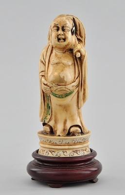 Appraisal: A Carved Ivory Figure of Budai Carved ivory standing Budei