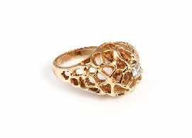 Appraisal: A ct gold stylised honeycomb diamond set dress ring estimated