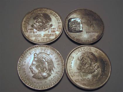 Appraisal: Mexican silver peso coins together with a Venezuelian silver Bolivares