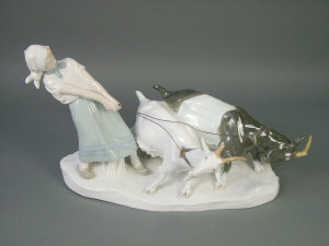 Appraisal: A Meissen figural group circa of a goat girl with