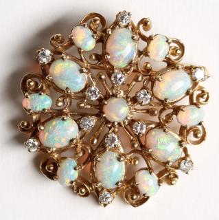 Appraisal: K Opal Diamond Pendant Brooch With central opal having an