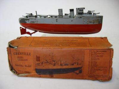 Appraisal: A Sutcliffe Grenville Destroyer tin plate clockwork powered grey with