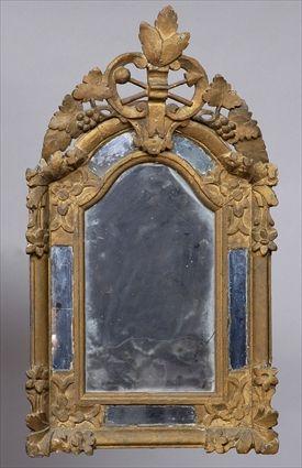 Appraisal: ITALIAN ROCOCO CARVED GILTWOOD SMALL MIRROR The plate with serpentine