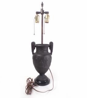 Appraisal: Bronze Urn Urn-shaped table lamp with classical imagery H x