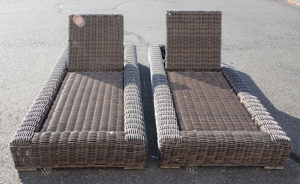 Appraisal: Pair of Rattan outdoor chaise lounges Pair of Rattan outdoor