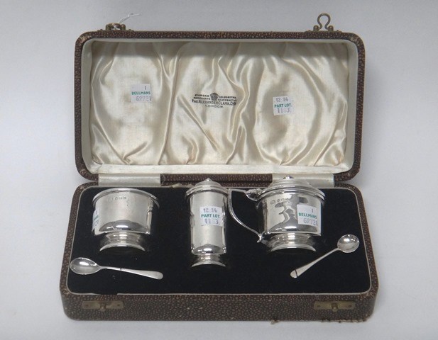 Appraisal: A silver three piece condiment set comprising a mustard pot