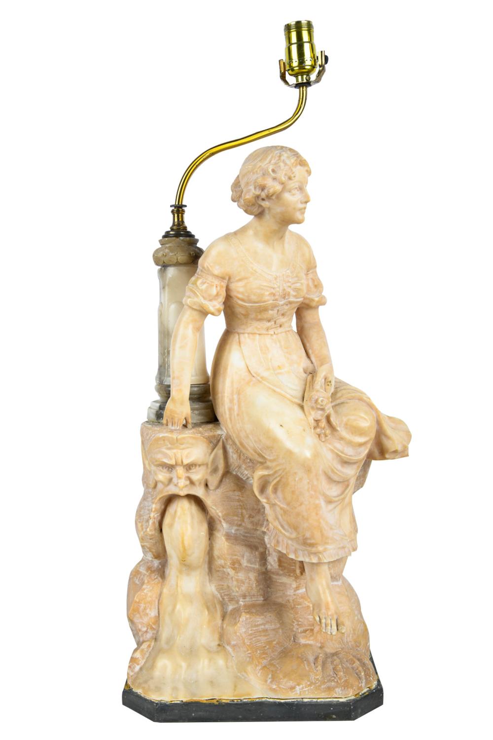 Appraisal: CARVED ALABASTER FIGURE OF A SEATED WOMANmounted as a table