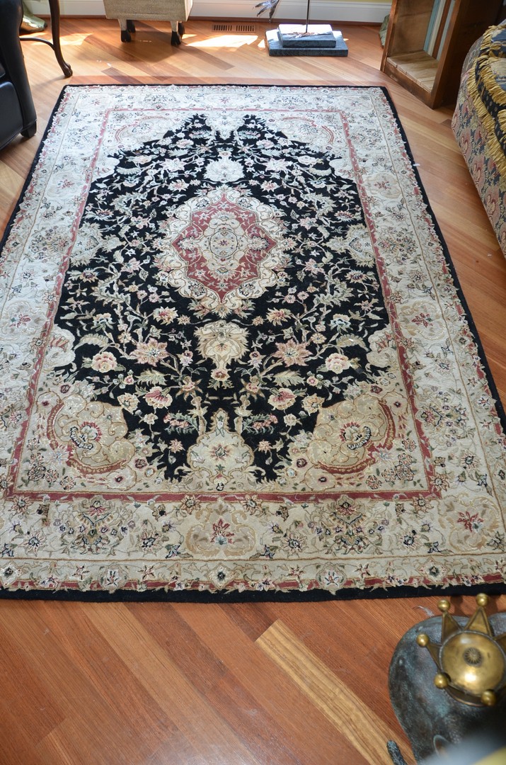 Appraisal: x Floral Persian style machine made carpet