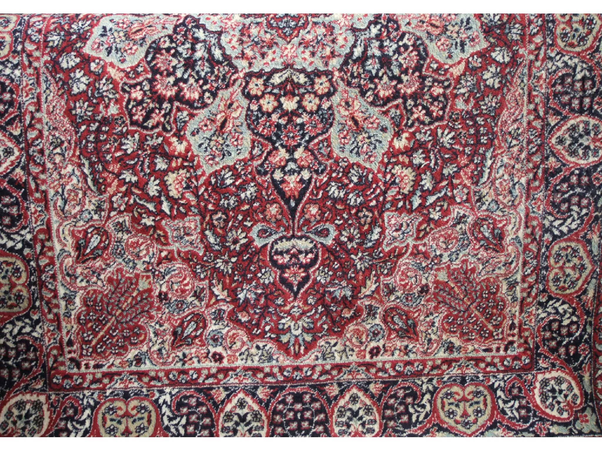 Appraisal: A pair of eastern style wool carpets the deep red