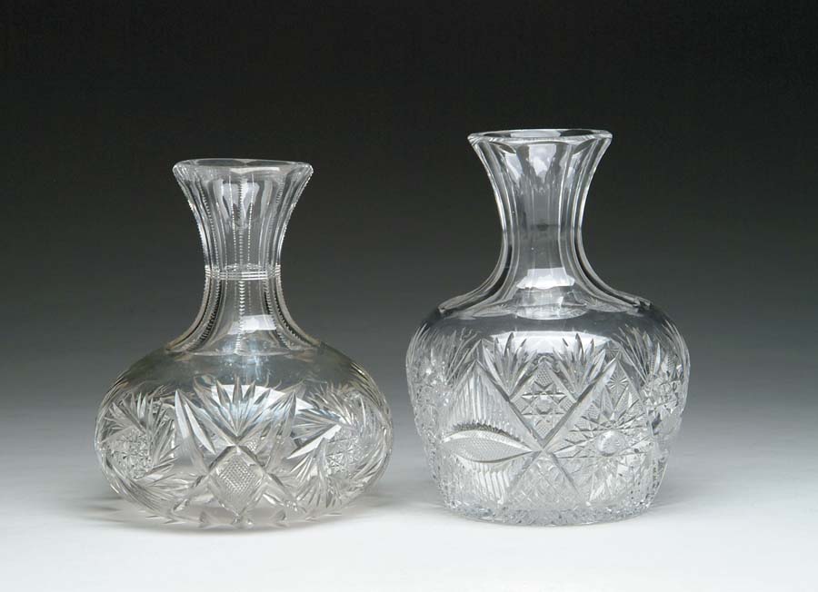 Appraisal: TWO CUT GLASS WATER CARAFES Cut in hobstar strawberry and