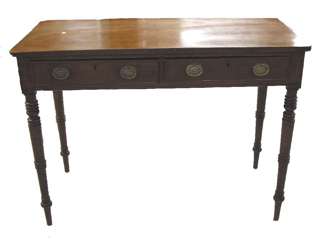 Appraisal: Victorian mahogany side table the rectangular top over two frieze