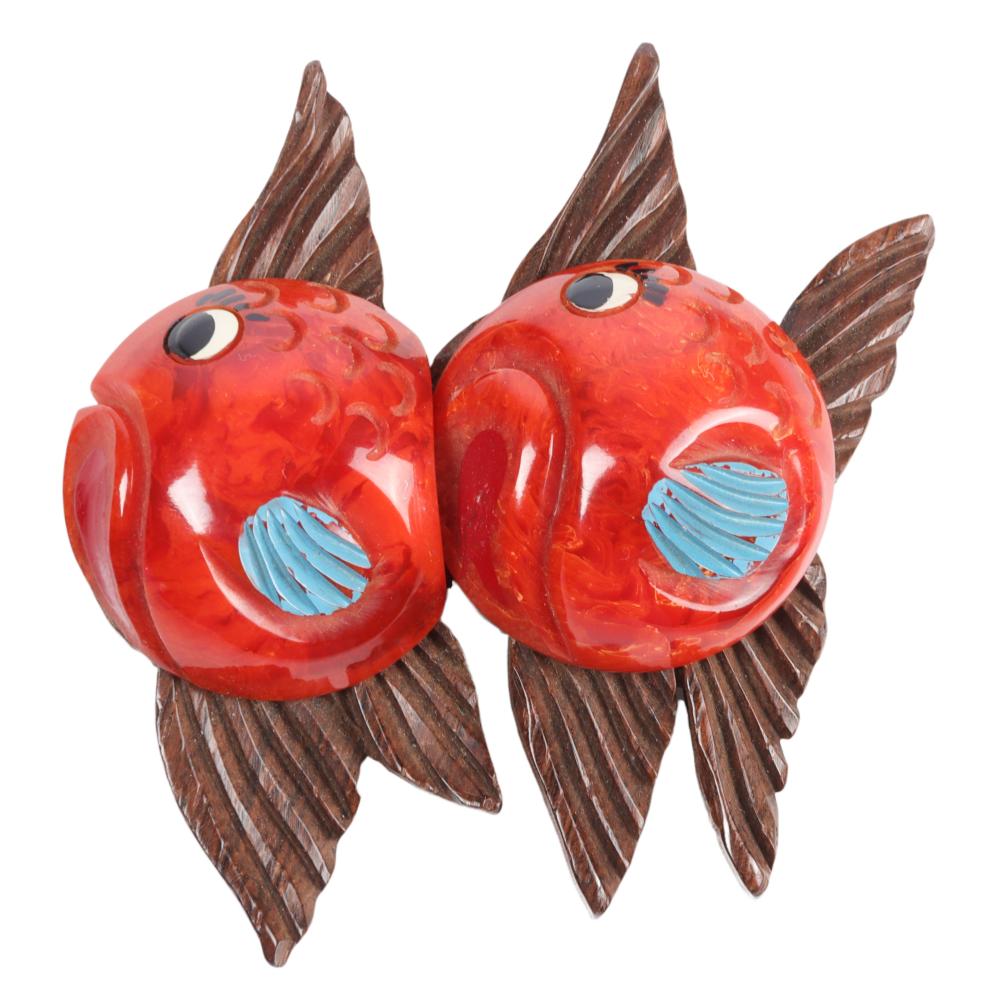 Appraisal: MARTHA SLEEPER BAKELITE AND WOOD DOUBLE FISH PIN H X