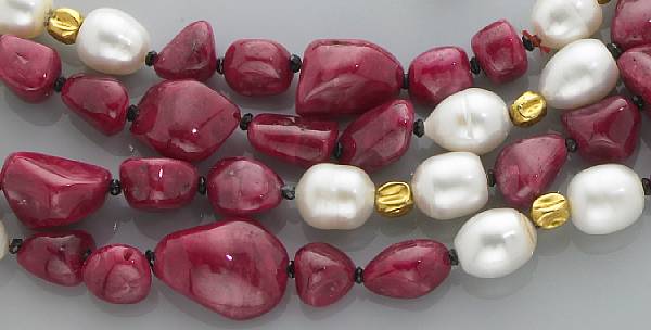 Appraisal: Ruby and Pearl Rope Necklace A stylish necklace consisting of