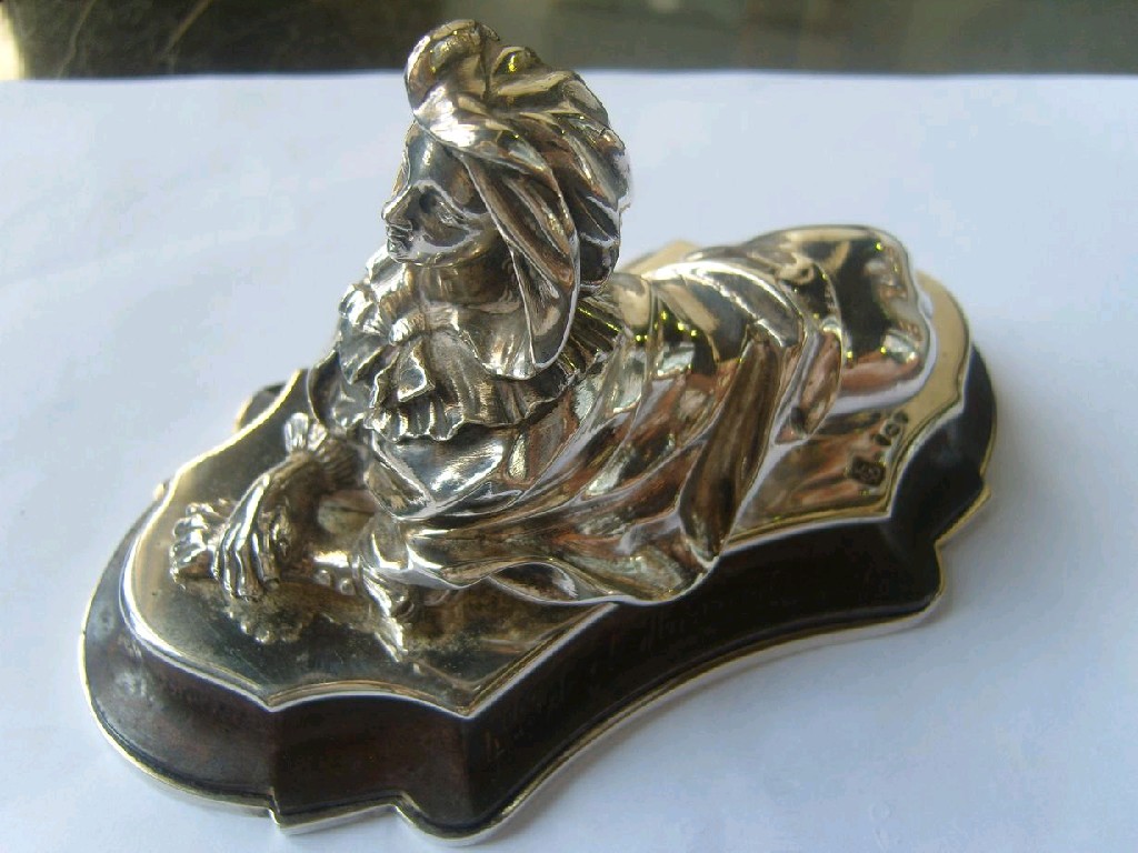 Appraisal: A good quality Victorian silver Sphinx with a stylish female